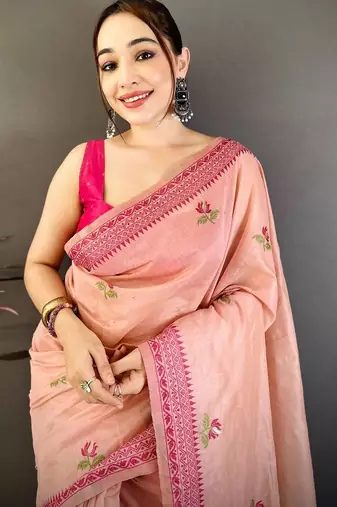 pink color muga cotton blend woven with flower printed saree