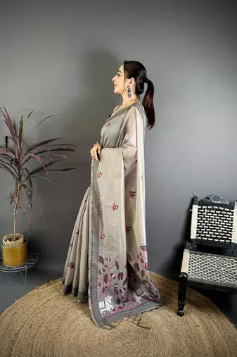 grey color muga cotton blend woven with flower printed saree