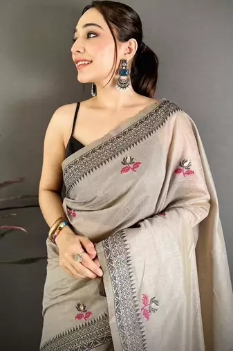 grey color muga cotton blend woven with flower printed saree