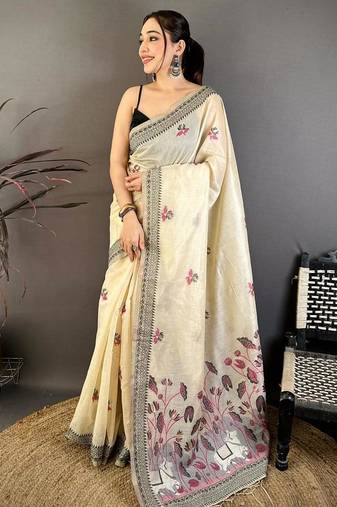 cream color muga cotton blend woven with flower printed saree