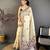 cream color muga cotton blend woven with flower printed saree