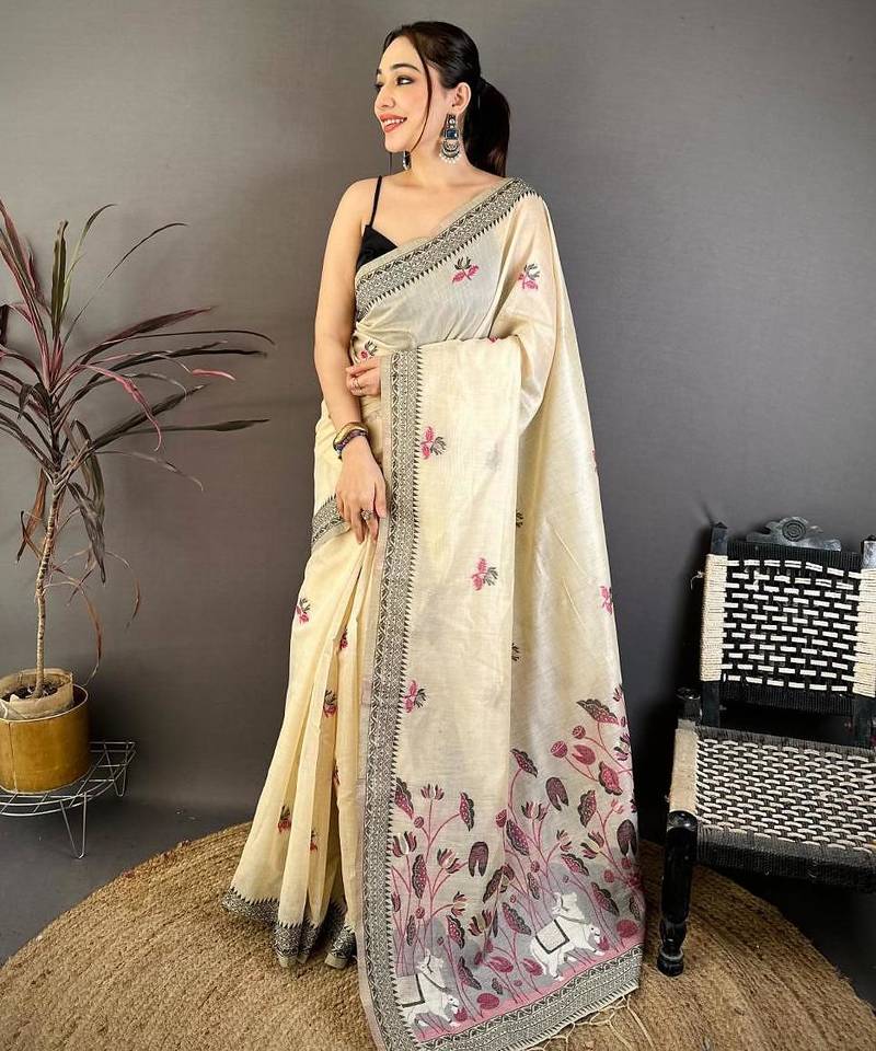 cream color muga cotton blend woven with flower printed saree