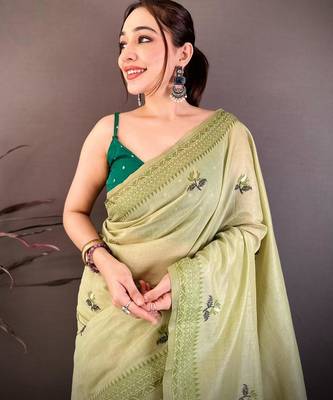 green color muga cotton blend woven with flower printed saree 4