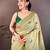 green color muga cotton blend woven with flower printed saree