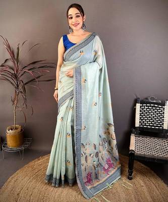 skyblue color muga cotton blend woven with flower printed saree 1