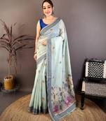skyblue color muga cotton blend woven with flower printed saree