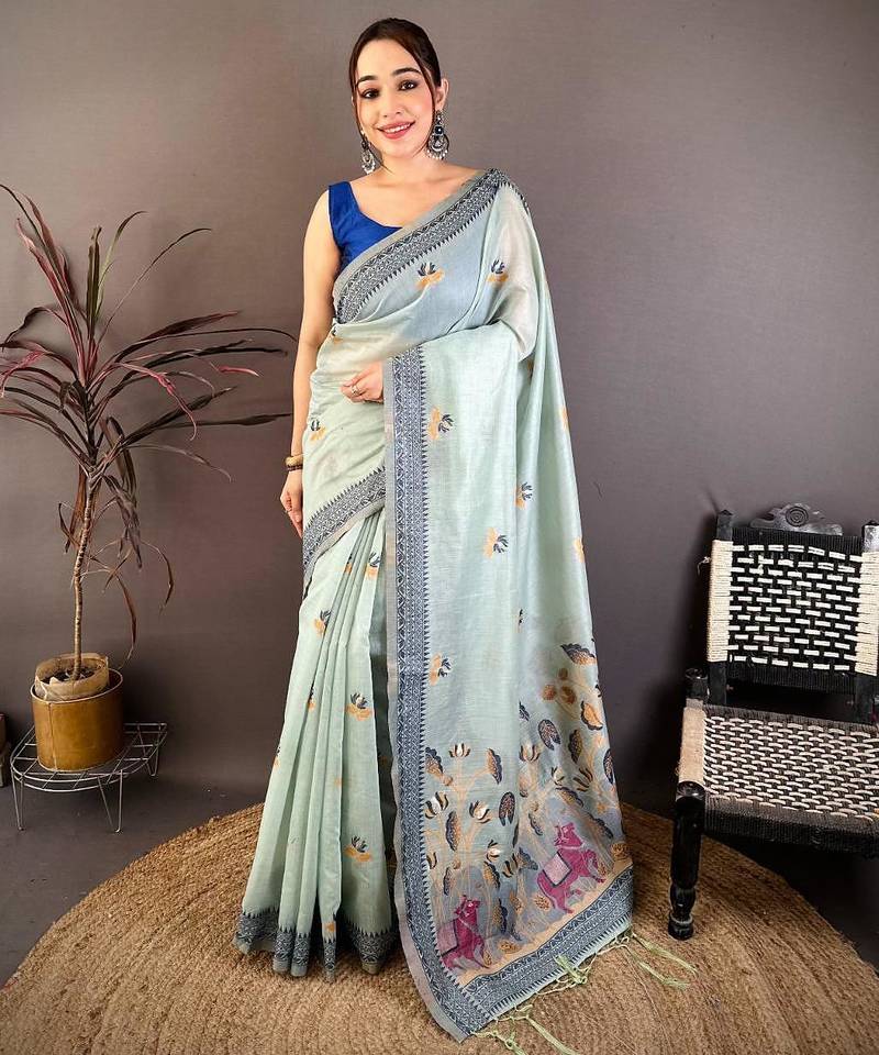 skyblue color muga cotton blend woven with flower printed saree