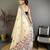 cream color muga cotton blend woven with flower printed saree