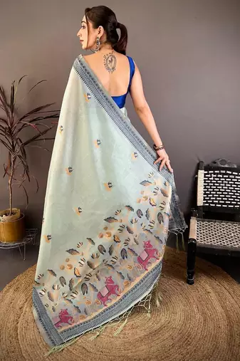 skyblue color muga cotton blend woven with flower printed saree