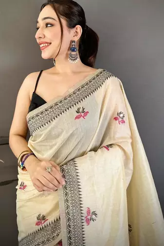 cream color muga cotton blend woven with flower printed saree
