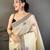 cream color muga cotton blend woven with flower printed saree