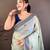 skyblue color muga cotton blend woven with flower printed saree