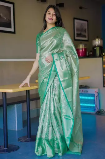 green color kanchipuram silk blend zari weaving saree with blouse piece
