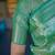 green color kanchipuram silk blend zari weaving saree with blouse piece
