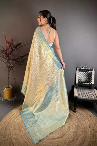 chiku-skyblue color kanchipuram silk blend flower zari woven saree with blouse