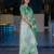 green color kanchipuram silk blend zari weaving saree with blouse piece