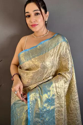 chiku-skyblue color kanchipuram silk blend flower zari woven saree with blouse