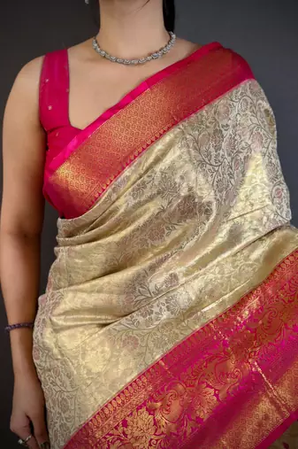 chiku-rani color kanchipuram silk blend flower zari woven saree with blouse