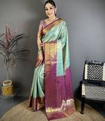 sky blue color kanjivaram silk blend flower zari woven saree with blouse