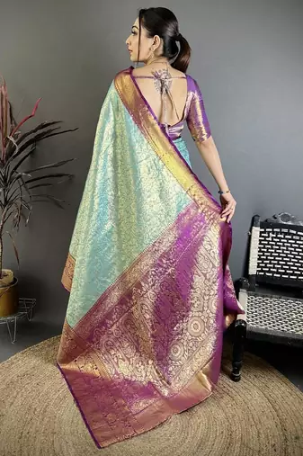 sky blue color kanjivaram silk blend flower zari woven saree with blouse