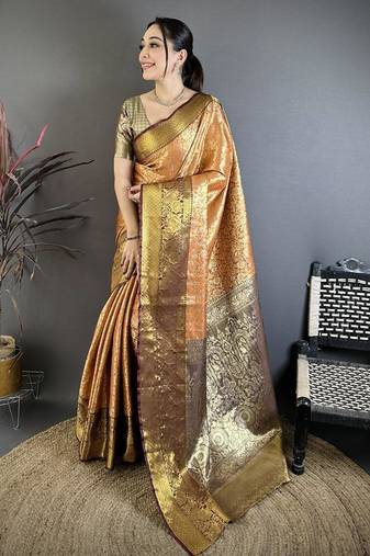 orange color kanjivaram silk blend flower zari woven saree with blouse