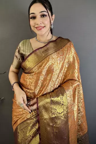 orange color kanjivaram silk blend flower zari woven saree with blouse