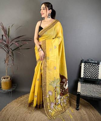 yellow color muga cotton blend woven motif saree with blouse 1