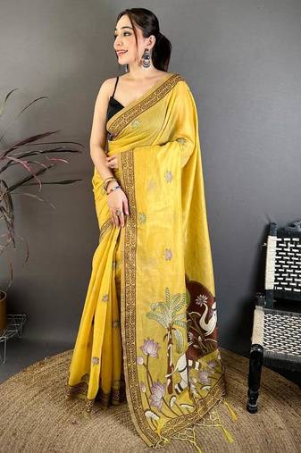 yellow color muga cotton blend woven motif saree with blouse