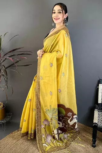yellow color muga cotton blend woven motif saree with blouse