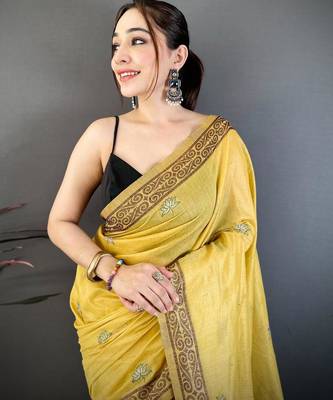 yellow color muga cotton blend woven motif saree with blouse 4