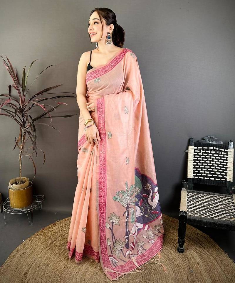 pink color muga cotton blend woven motif saree with blouse