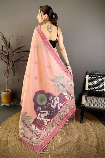 pink color muga cotton blend woven motif saree with blouse