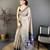grey color muga cotton blend woven motif saree with blouse