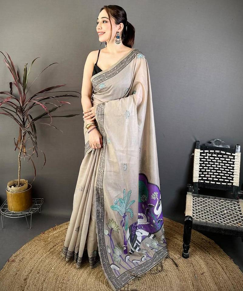 grey color muga cotton blend woven motif saree with blouse