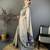 grey color muga cotton blend woven motif saree with blouse
