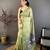 green color muga cotton blend woven motif saree with blouse