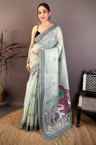 sky blue color muga cotton blend woven motif saree with blouse