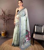 sky blue color muga cotton blend woven motif saree with blouse