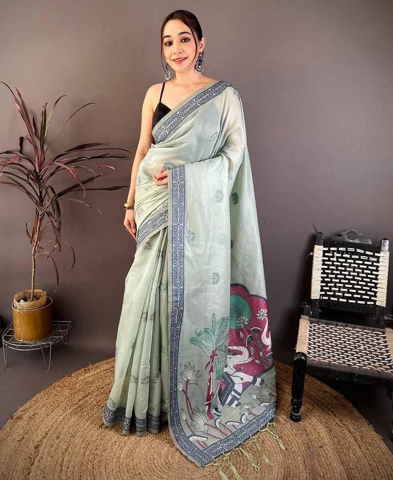 sky blue color muga cotton blend woven motif saree with blouse