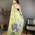 green color muga cotton blend woven motif saree with blouse