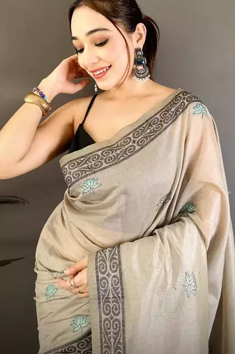 grey color muga cotton blend woven motif saree with blouse