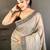 grey color muga cotton blend woven motif saree with blouse