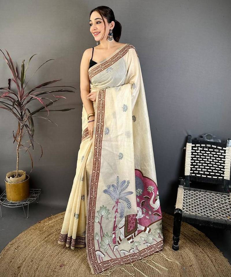 cream color muga cotton blend woven motif saree with blouse
