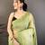 green color muga cotton blend woven motif saree with blouse
