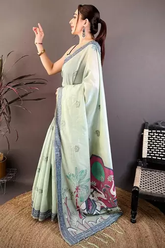 sky blue color muga cotton blend woven motif saree with blouse