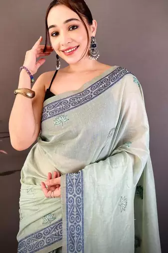 sky blue color muga cotton blend woven motif saree with blouse