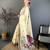 cream color muga cotton blend woven motif saree with blouse