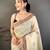 cream color muga cotton blend woven motif saree with blouse