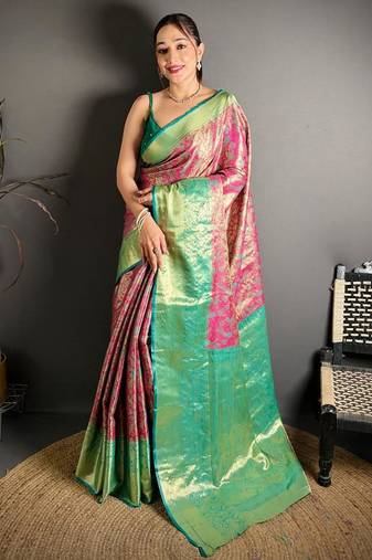 rani pink color kanjivaram silk blend zari woven saree with blouse