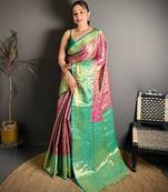 rani pink color kanjivaram silk blend zari woven saree with blouse